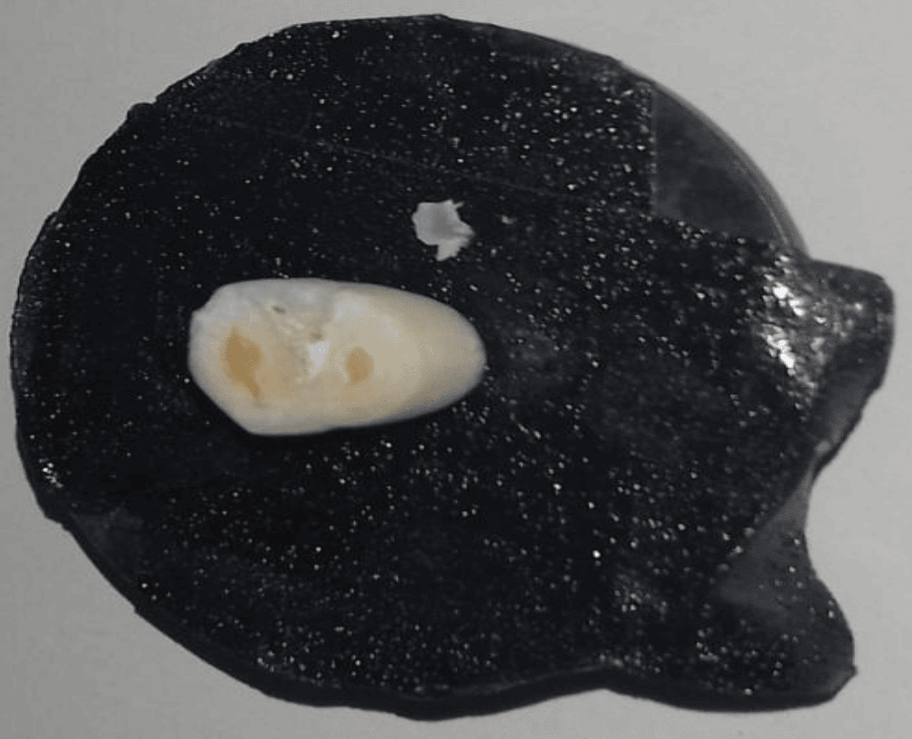 Effectiveness of Different Etching Agents on Enamel Surface and Shear